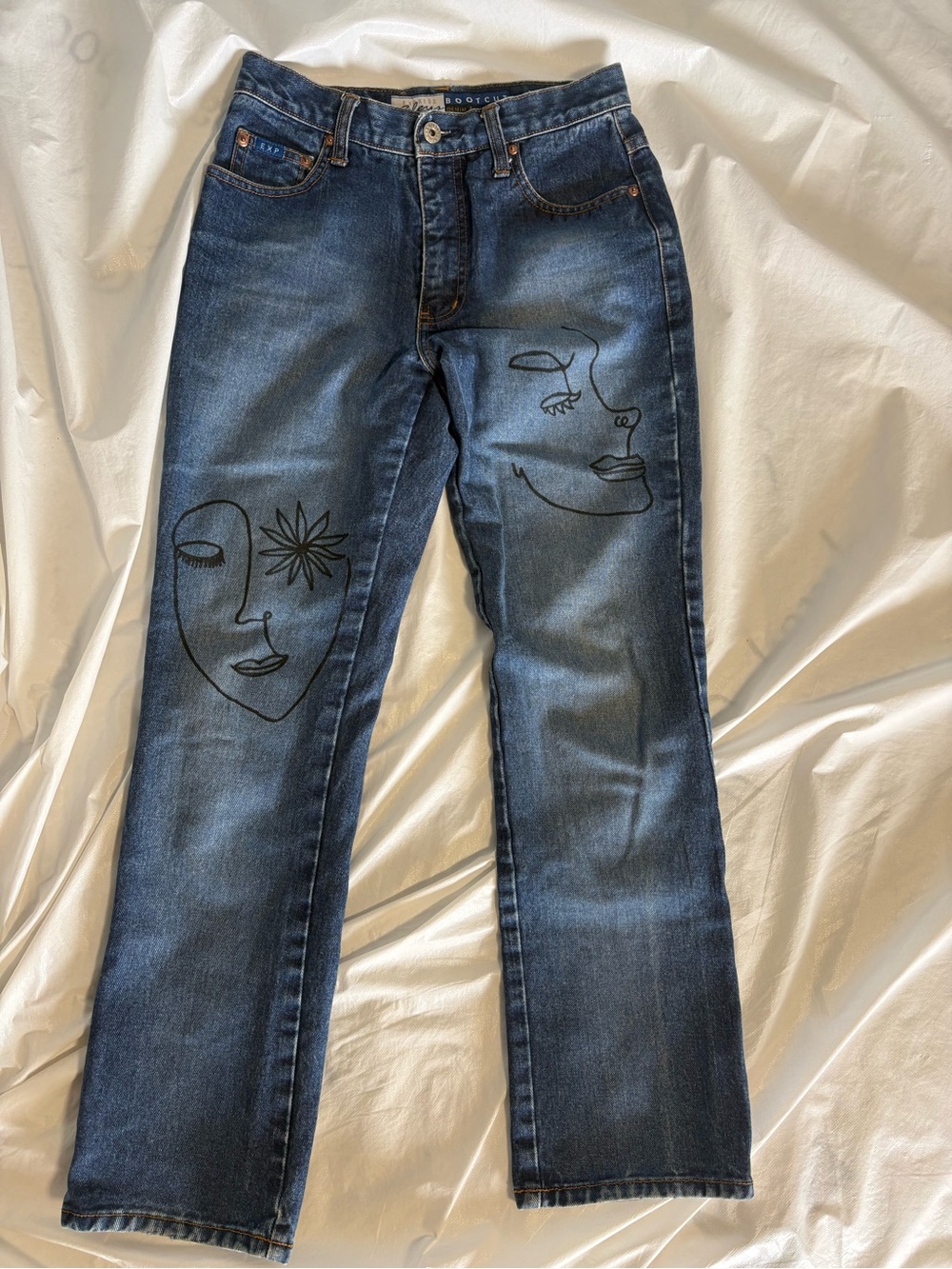 Dark Blue Boot-Cut Jeans with Abstract Face Embroidery